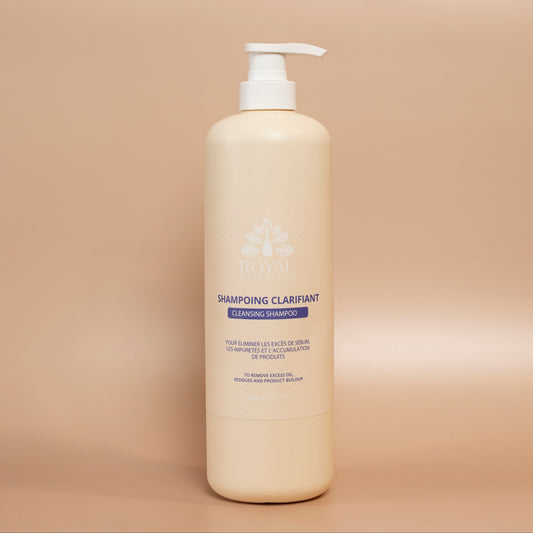 ROYAL Clarifying Shampoo 980 ml bottle photographed against a beige background.
