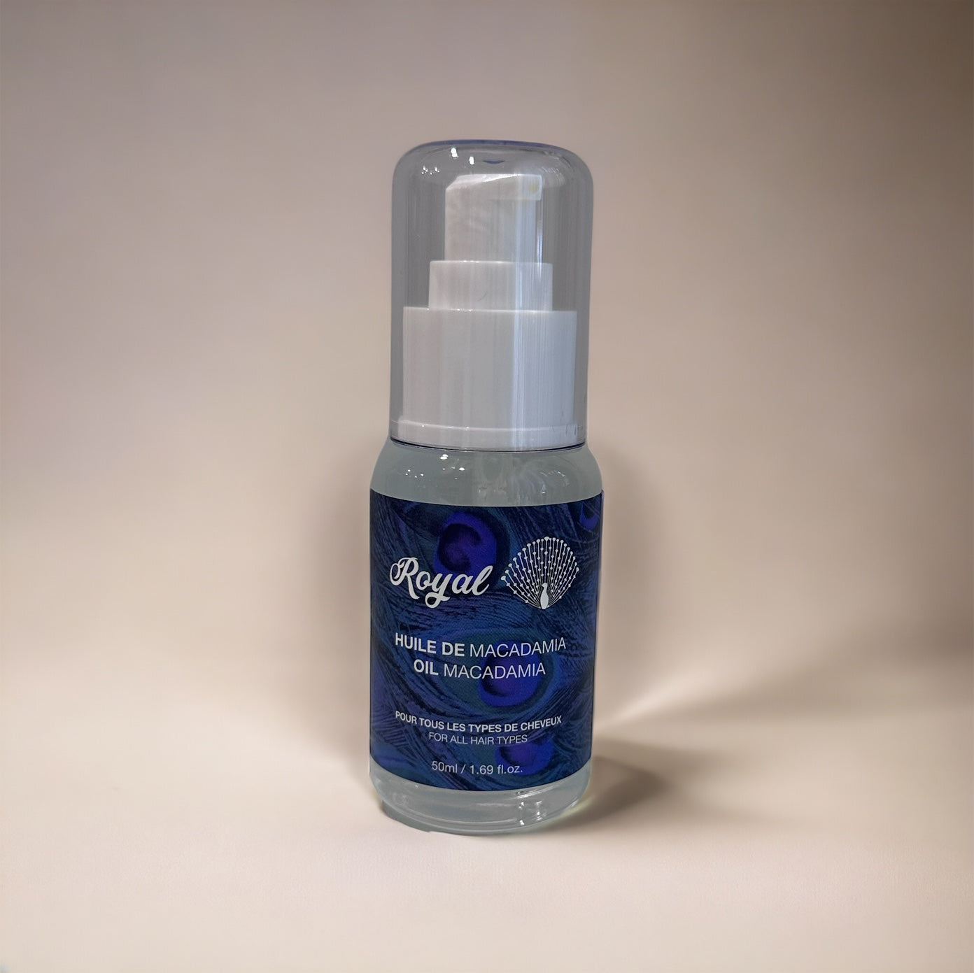 A bottle of Royal Hydrating Hair Oil, designed to deeply nourish and moisturize hair, leaving it soft, shiny, and healthy.