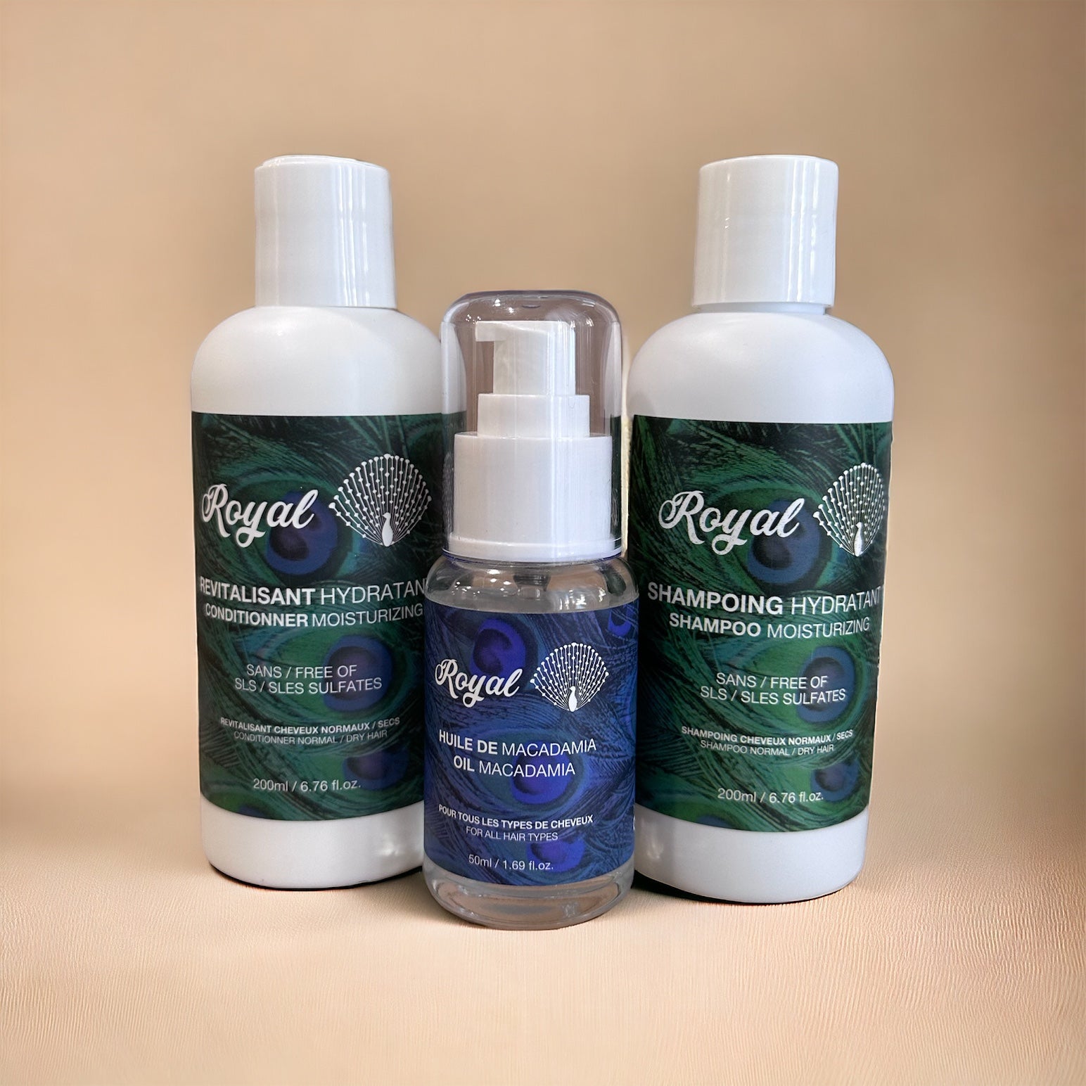 Royal Hydration Travel products including moisturizing shampoo, moisturizing conditioner, and hydrating hair oil, shown without packaging, designed to maintain soft, nourished, and healthy hair on the go.