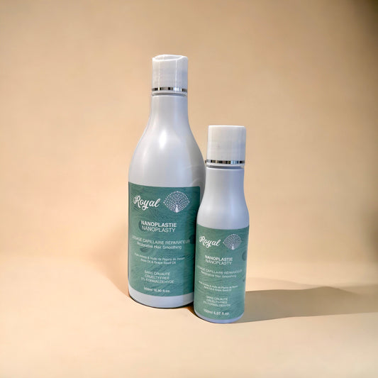 Royal Nanoplasty treatment bottles in 150ml and 500ml sizes shown together, designed to smooth, repair, and deeply nourish hair for a sleek, healthy, and shiny finish.