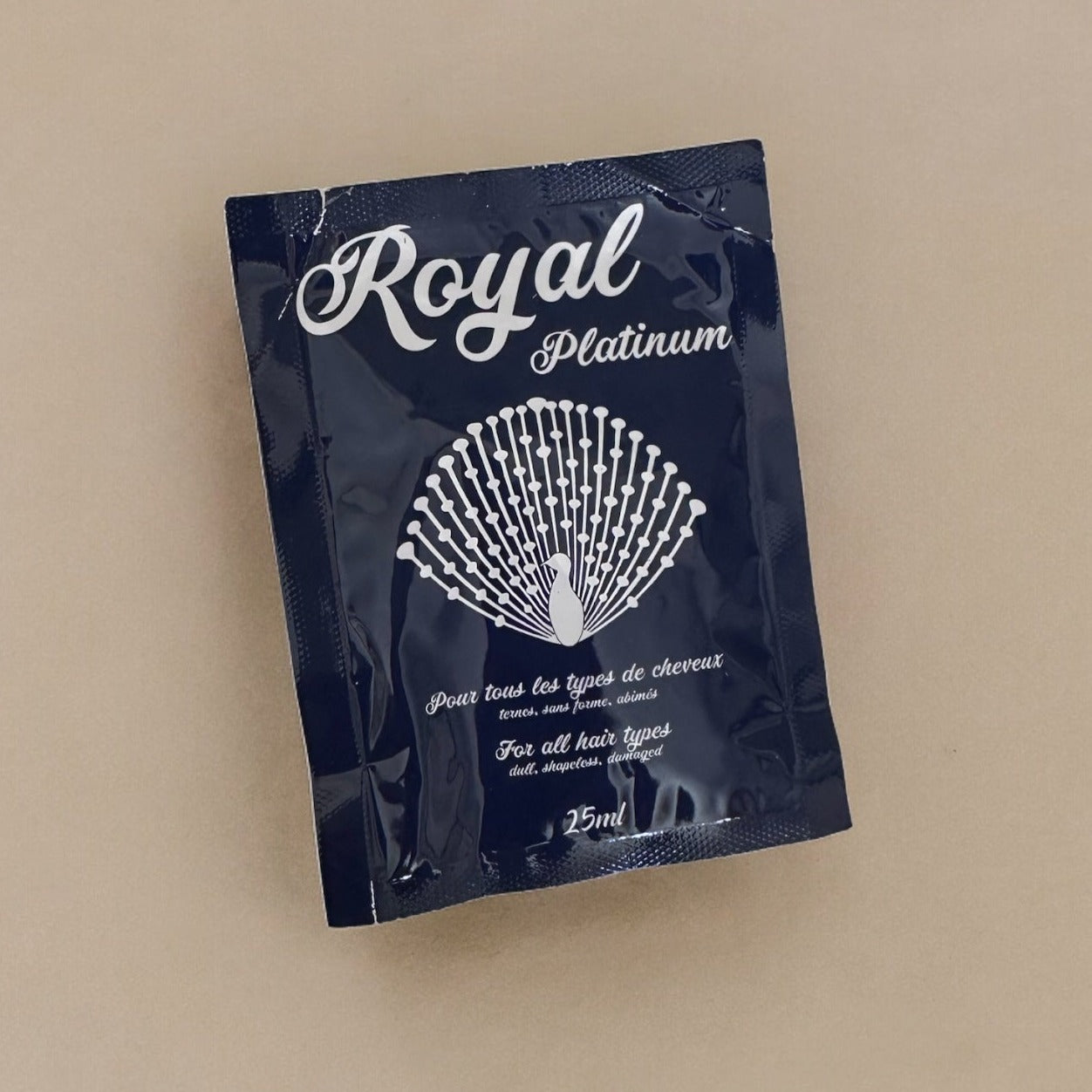 A 25g tester sachet of Royal Platinum Hair Botox, designed for trial use to deeply repair, smooth, and nourish hair, leaving it healthy, shiny, and silky.