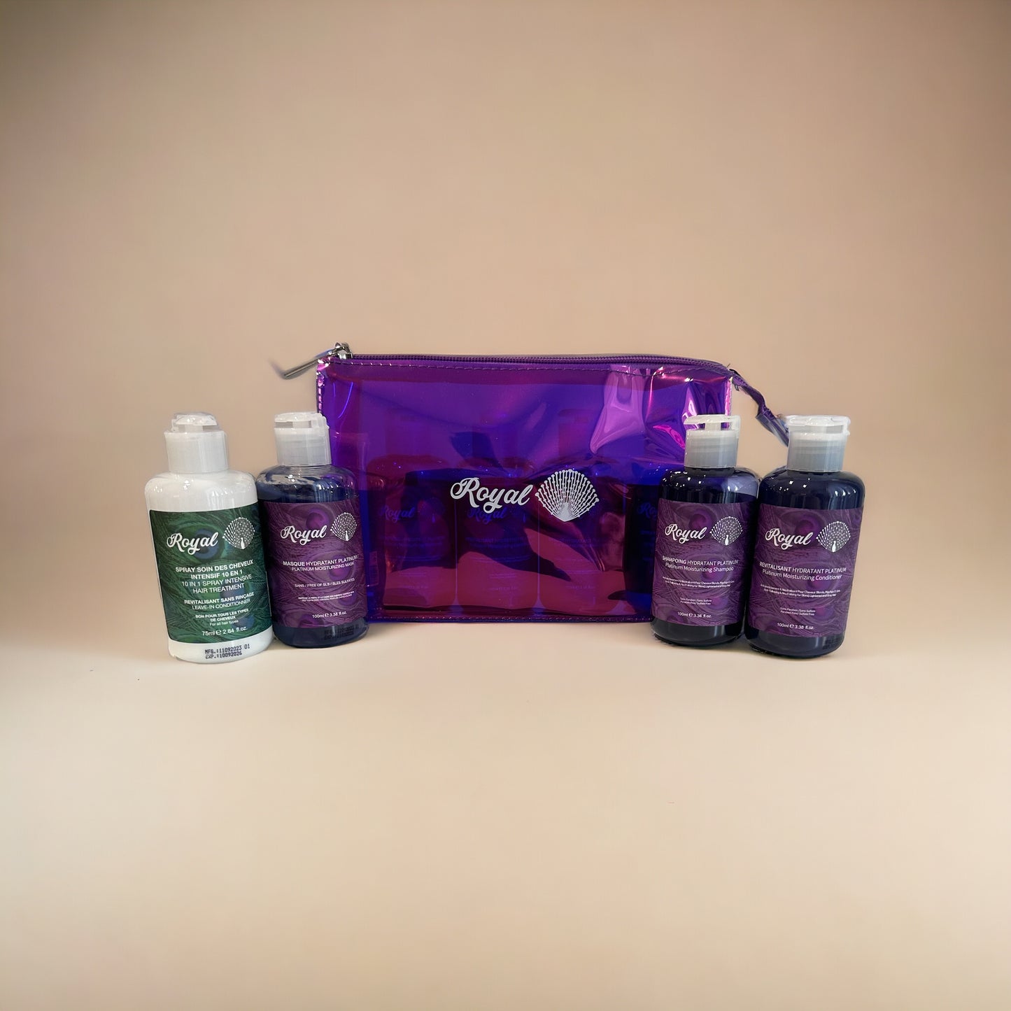 Royal Platinum Travel Set products removed from packaging, including 100ml shampoo, 100ml conditioner, 100ml hair mask, and 75ml leave-in conditioner, designed to deeply hydrate, nourish, and smooth hair while on the go.