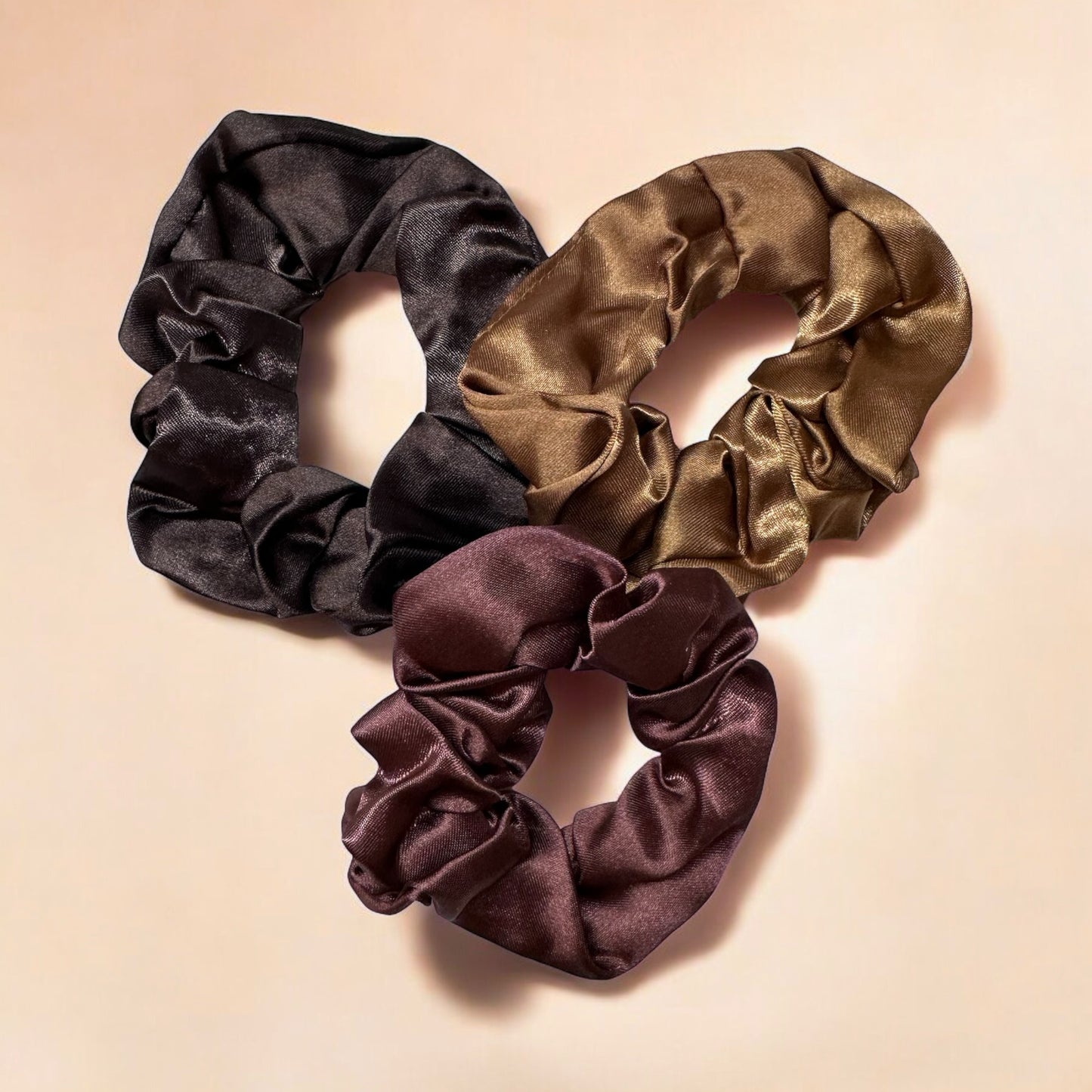 Set of 3 Royal satin hair scrunchies in brown, designed to gently hold hair without causing breakage or creases, while adding a stylish touch.