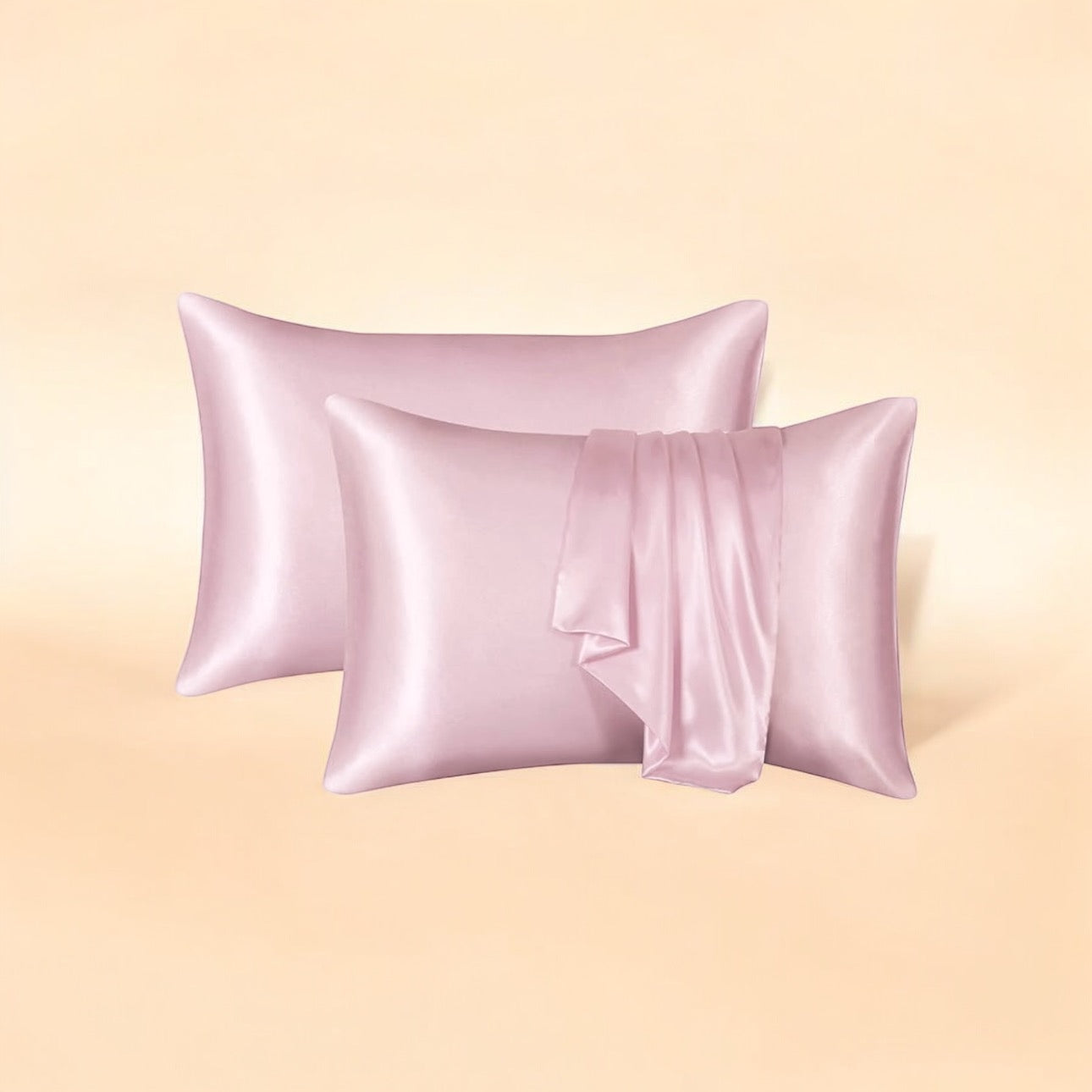 Royal satin pillowcase in light pink, designed to reduce friction on hair and skin, promoting smooth, healthy hair and a comfortable sleep.