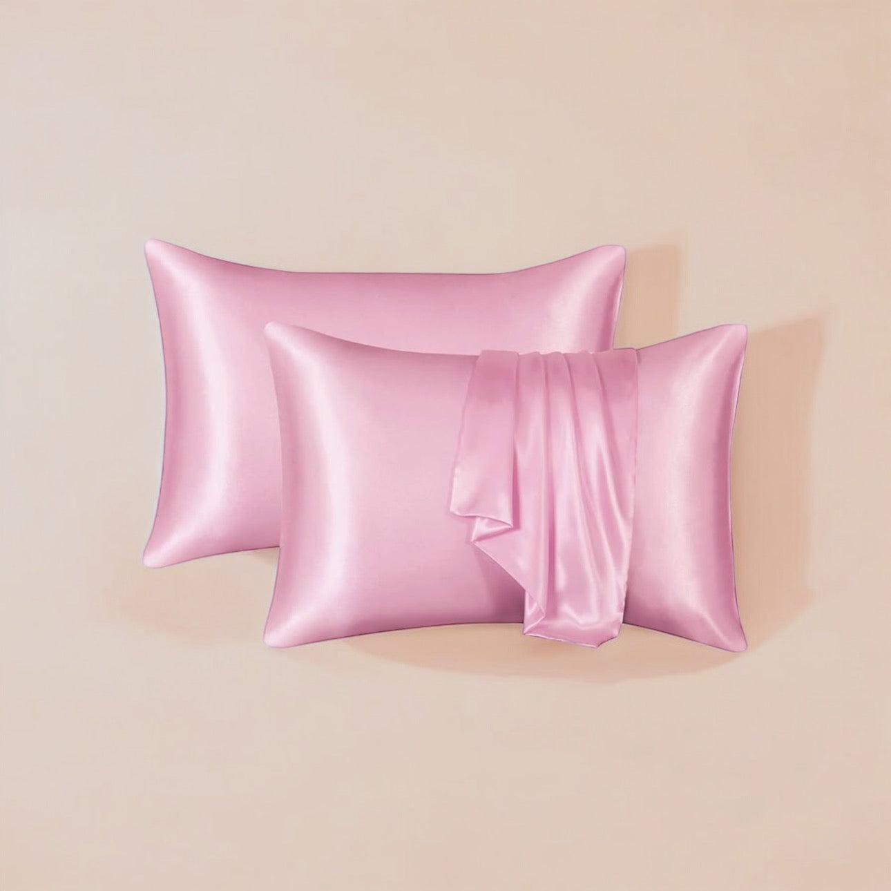 Royal satin pillowcase in pink, designed to reduce friction on hair and skin, promoting smooth, healthy hair and a comfortable sleep.